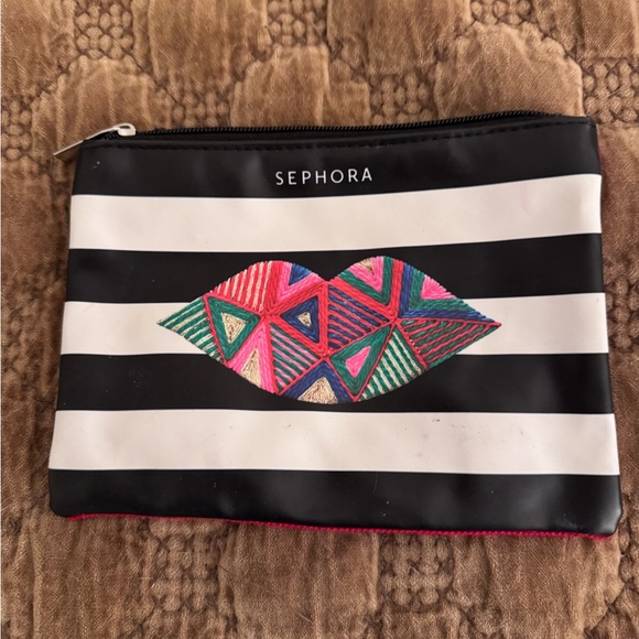 Sephora Handbags - Sephora Striped Pouch with Vibrant Lip Design